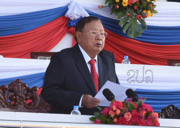 LPRP Secretary General, President of Laos Mr Bounnhang Vorachit speaks at Lao People's Armed Forces 70th Anniversary Parade. (Image KPL)