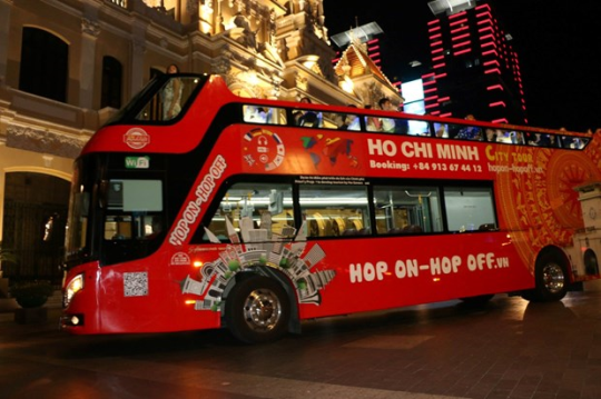 All-night hop-on hop-off bus tour launched in HCM City