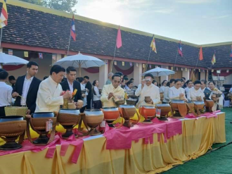 President Thongloun Sisoulith Joins Thousands in Almsgiving Ceremony for That Luang Festival