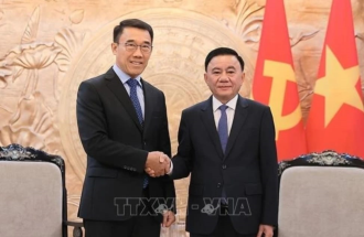 Vietnamese, Lao Parties enhance relations