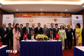 Vietnam, Laos strengthen sci-tech, digital cooperation