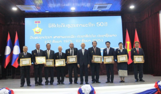 Senior Lao Officials Receive 50th Anniversary Medals Marking Founding of the Lao PDR