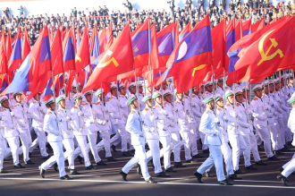  Laos Marks 50th Anniversary of Republic with Grand Parade