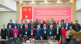 Foreign Media Delegation Visits Nhan Dan Newspaper During 14th National Party Congress