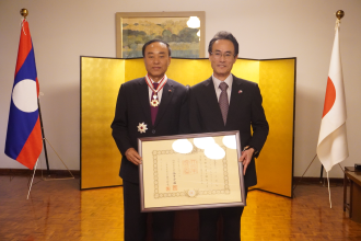Dr. Bounfeng Phoummalaysith Conferred the Order of the Rising Sun, Gold and Silver Star