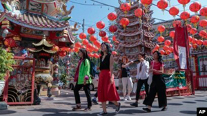 ນັກທ່ອງທ່ຽວສາກົນເດີນທາງເຂົ້າ-ອອກ ໃນໄລຍະບຸນກຸດຈີນ ເພີ່ມຂຶ້ນ ຢ່າງຕໍ່ເນື່ອງ