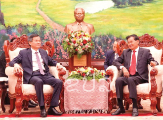 ເລຂາທິການໃຫຍ່ ຕອນຮັບຄະນະຜູ້ແທນສະຖາບັນການເມືອງແຫ່ງຊາດ ໂຮ່ຈີ່ມິງ