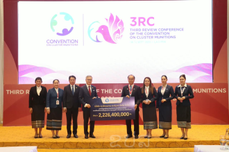 Companies provide nearly 7 billion kip to support cluster munitions conference